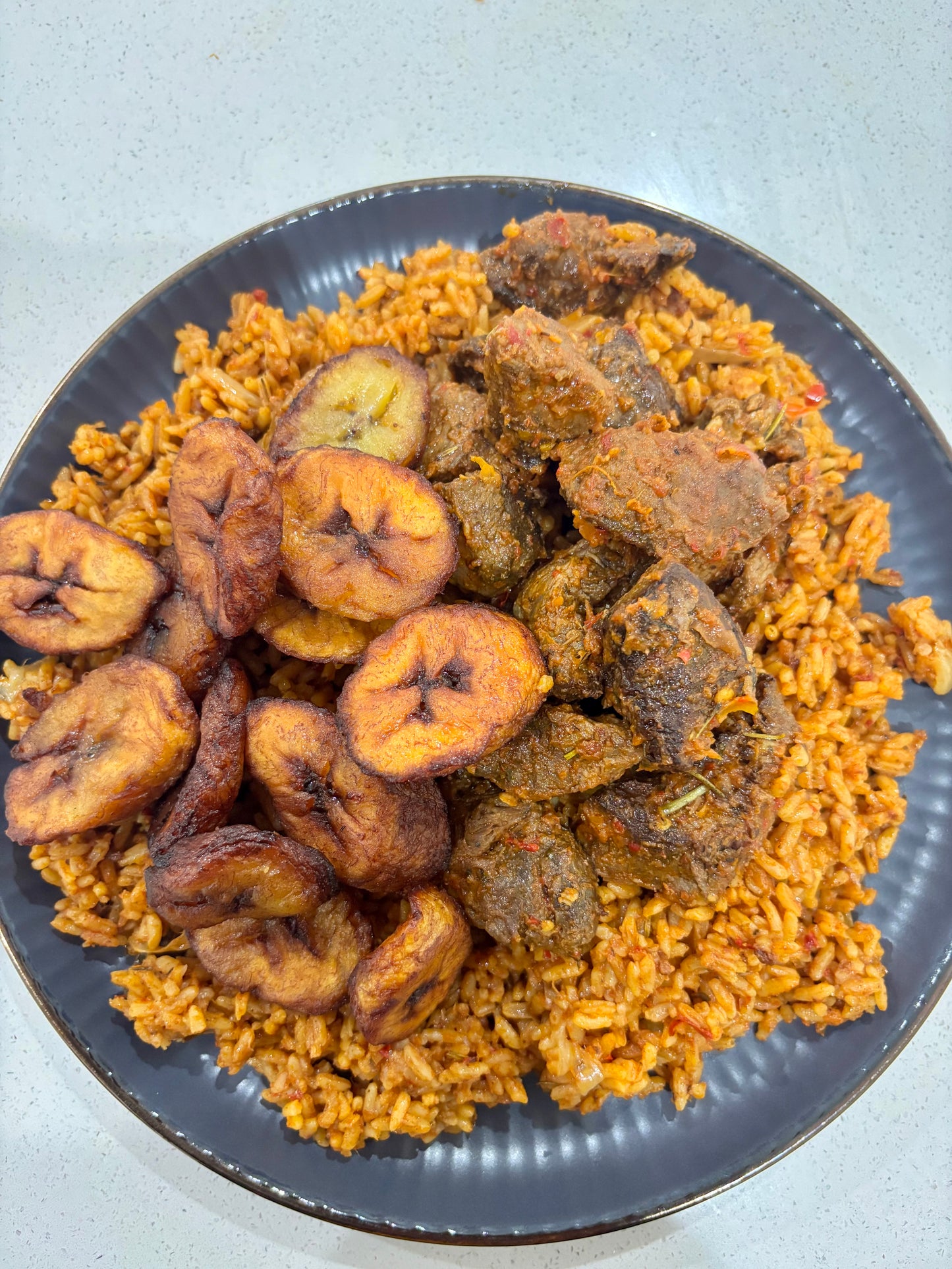 Jollof rice / Peppered Beef Bites / Sweet Plantains